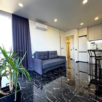 Олега Мудрака вул. (Генерала Наумова), 1-Б