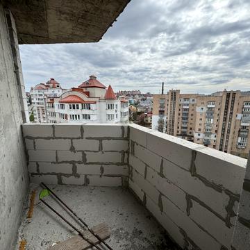 Коновальця вул., (Будинок)