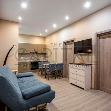 Євгена Коновальця вул. (Щорса), 36-Е