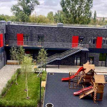 Олега Мудрака вул. (Генерала Наумова), 1-Б