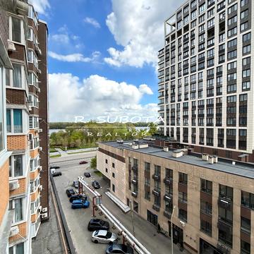 Набережна Перемоги вул., 1-Т