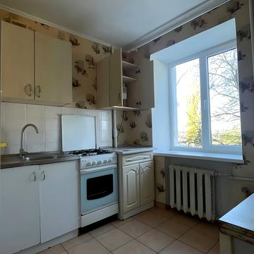 Жоліо Кюрі вул., 26