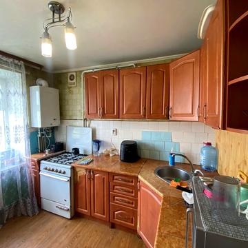 Євгена Коновальця вул., 120