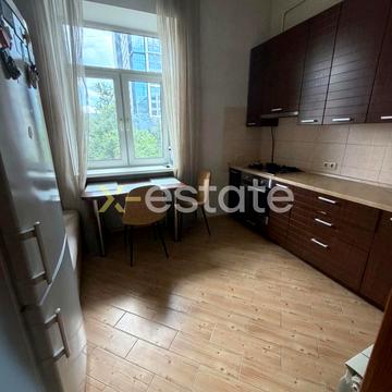 Євгена Коновальця вул. (Щорса), 7-9