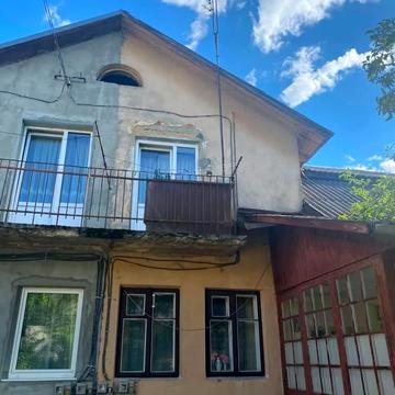 Будівельна вул., 25