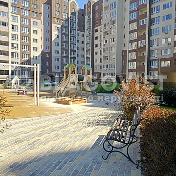 Леоніда Каденюка вул., Будинок Лион