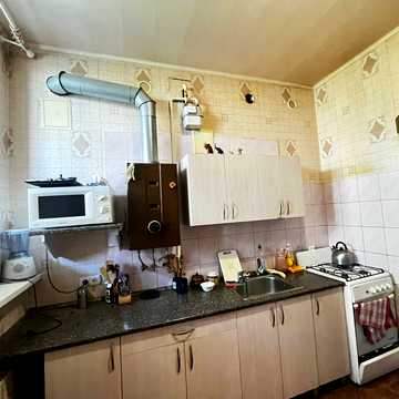 Незалежності вул. (Титова), 12