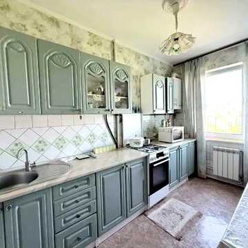 Героїв 128-ї Бригади вул. (8 Березня), 3