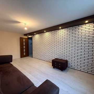 Героїв 128-ї Бригади вул. (8 Березня), 23