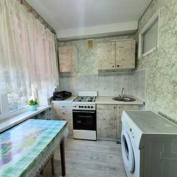 Олімпійська вул., 10