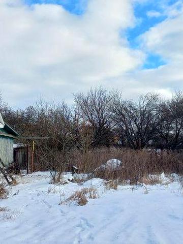 Продам пів будинка та земельну ділянку