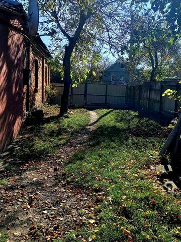 Продам половину будинку, м. Валки.терміново!