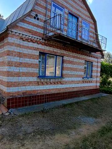 Продам фасадну ділянку з будинком в Корчаку