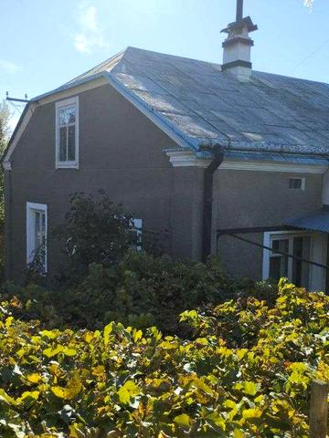 Земельна ділянка з будинком