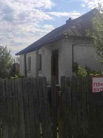 Продам будинок і земельну ділянку 15 соток.