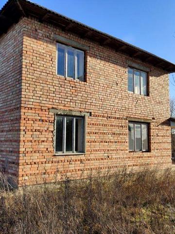 Двоповерховий житловий будинок