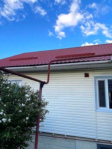 Продам 2-поверховий будинок з гаражем і ділянкою Таромське