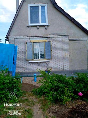 Кирпичный двухэтажный дом в СТ Озерное.