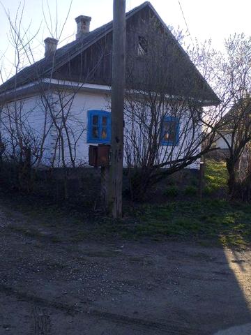 Будинок з земельною ділянкою