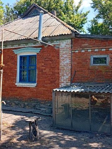 Будинок біля річки Сула в с. Мацківці