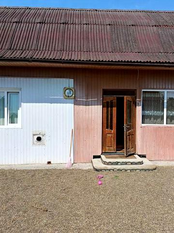 Деревяна хата під розбір
