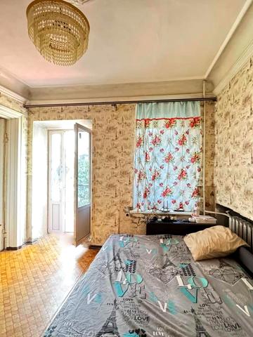 Тараса Кузьміна вул., 21