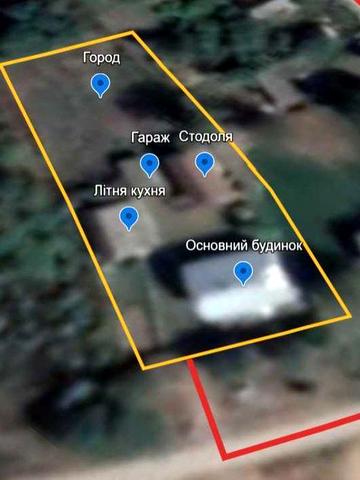 Земельна ділянка з будинком, літньою кухнею та гаражем в с. Озеряни