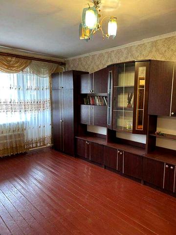 Продається двокімнатна квартира з гаражем, літньою кухнею та садом!