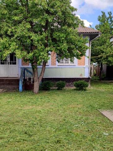 Будинок із господарством