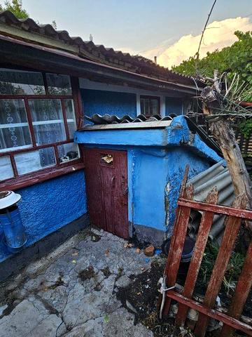 Часть дома в общем дворе