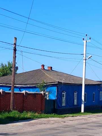 Продається територія з будинком