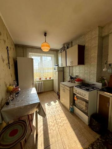 Янтарна вул., 77