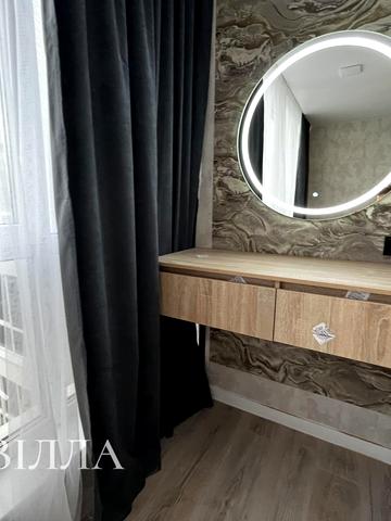 Текстильна вул., 24-Е