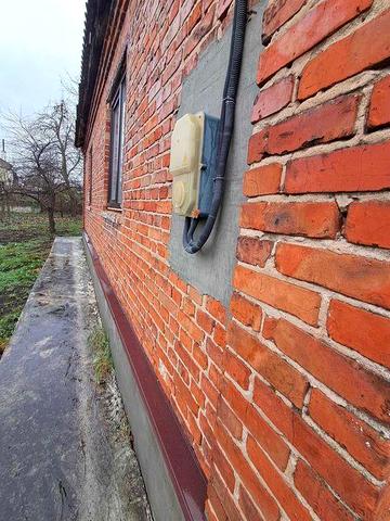 Продаж цегляного будинку