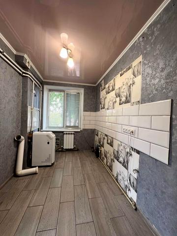 Першотравнева вул., 48