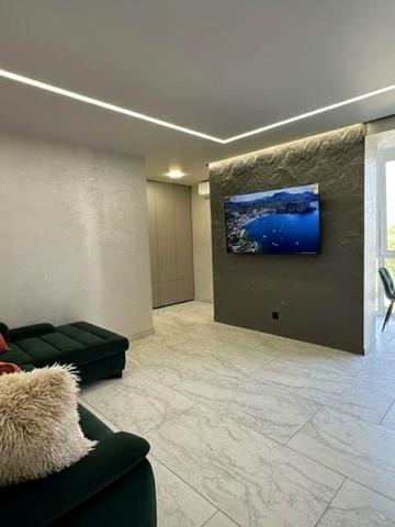 Дизайнерские апартаменты с душем и видом на город