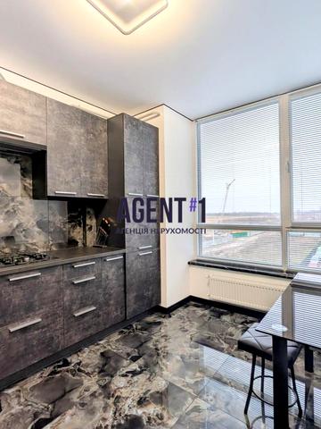 Будівельна вул., 2