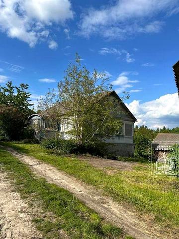 Продаж будинку з земельною ділянкою
