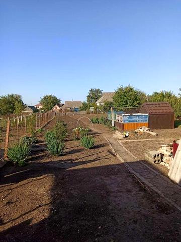 Продам половину будинку з окремим двором та окремим входом