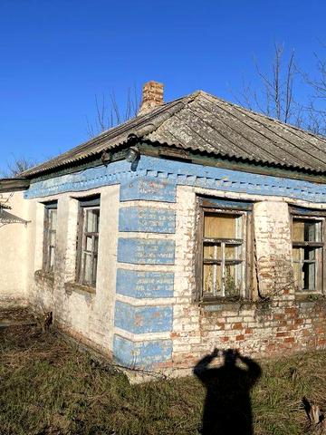 Продам землю з будинком та городом 50 соток