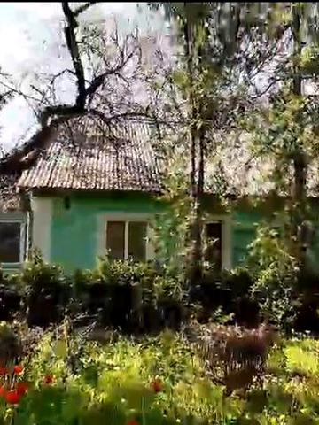 Ексклюзивна земельна ділянка з будинком у центрі міста
