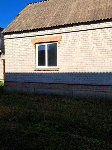 Продам новий будинок в селищі Томаківка.