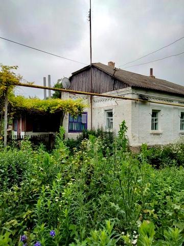 Нерухомість 1/2 будинку,квартира