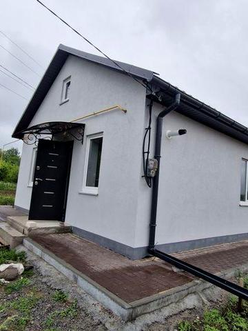 Продаж будинку земельною ділянкою 6 соток