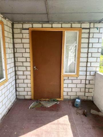 Продаж  дачного будинку із земельною ділянкою