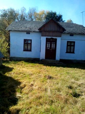 Будинок з земельною ділянкою