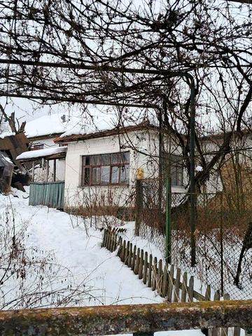 Будинок ,земельна ділянка