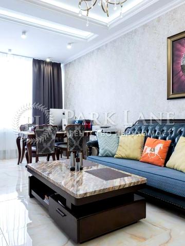 Євгена Коновальця вул. (Щорса), 34-А