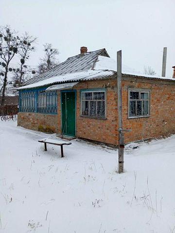 Земельна ділянка з будинком