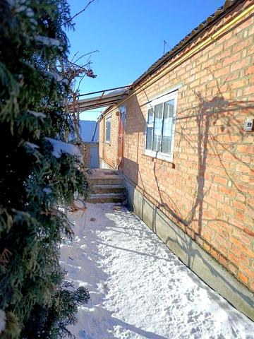 Будинок з ділянкою в смт. Вороновиця